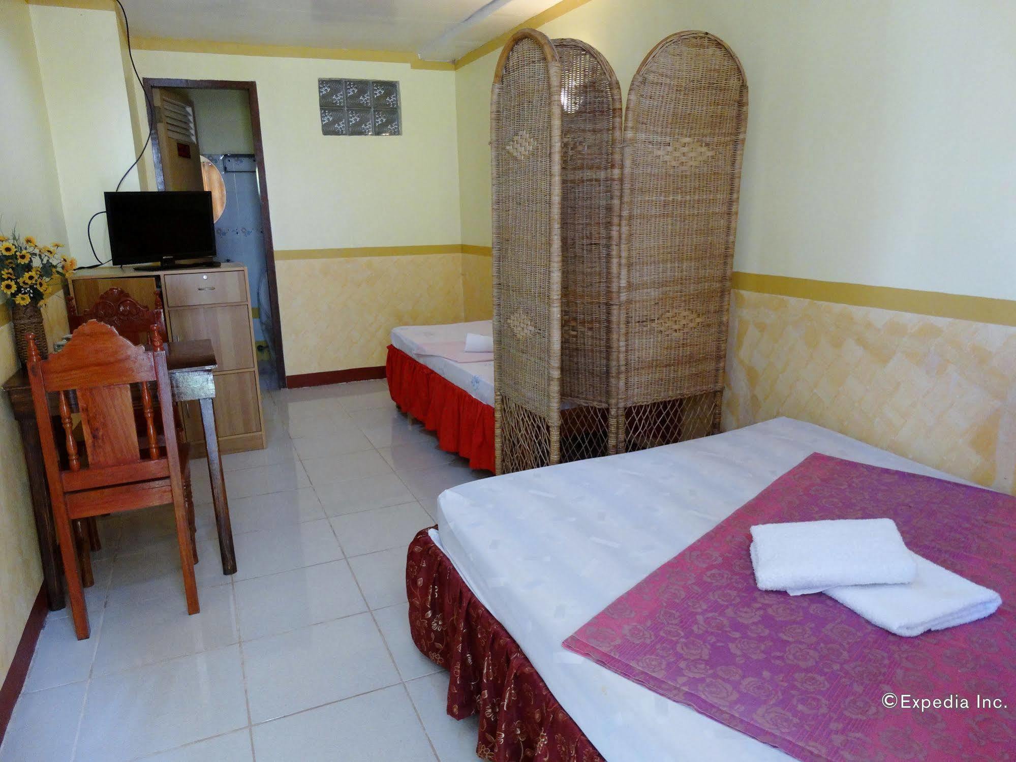 D'Lucky Garden Inn & Suites Tiniguiban Exterior foto